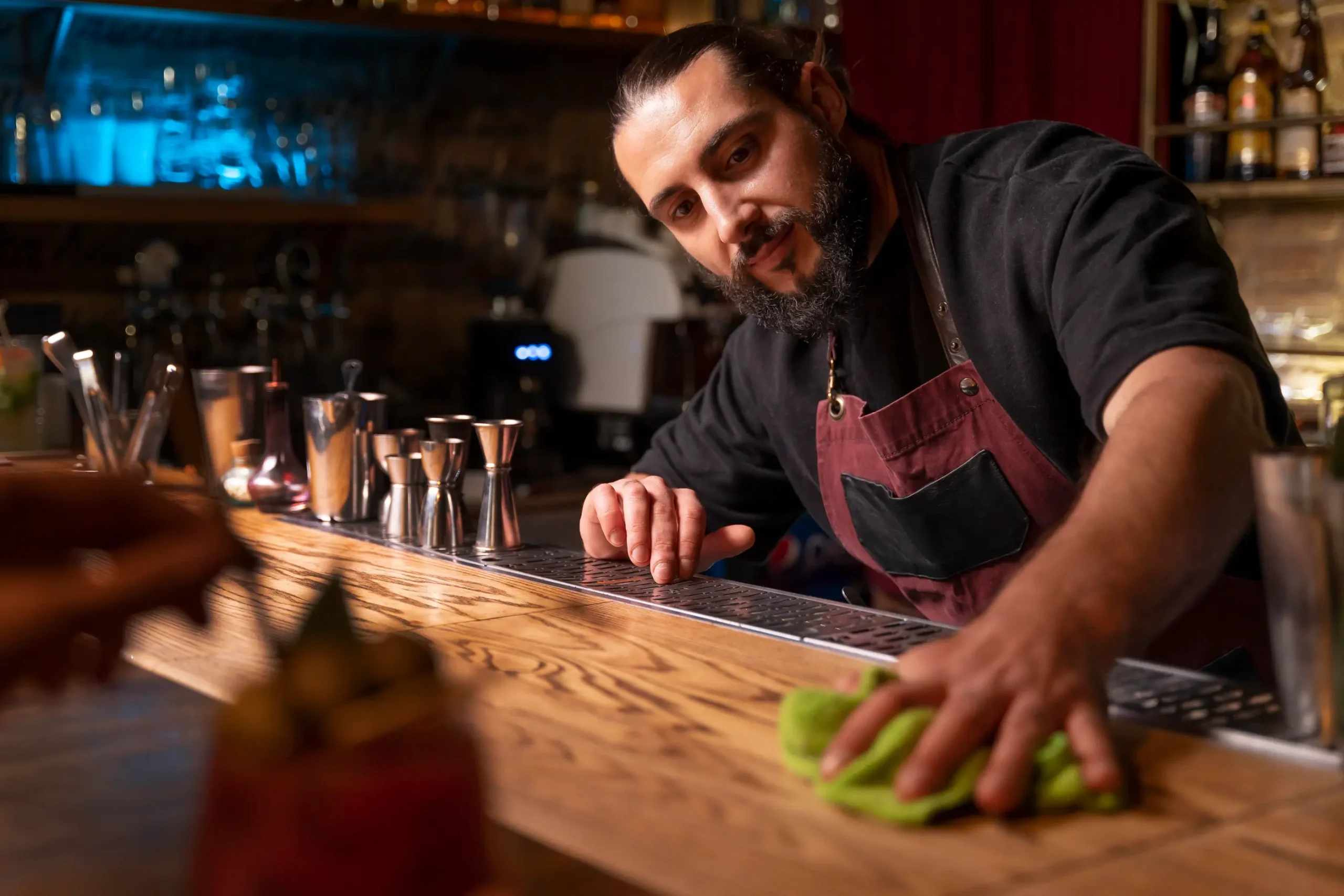 close-up-bartender-cocktail-shaker